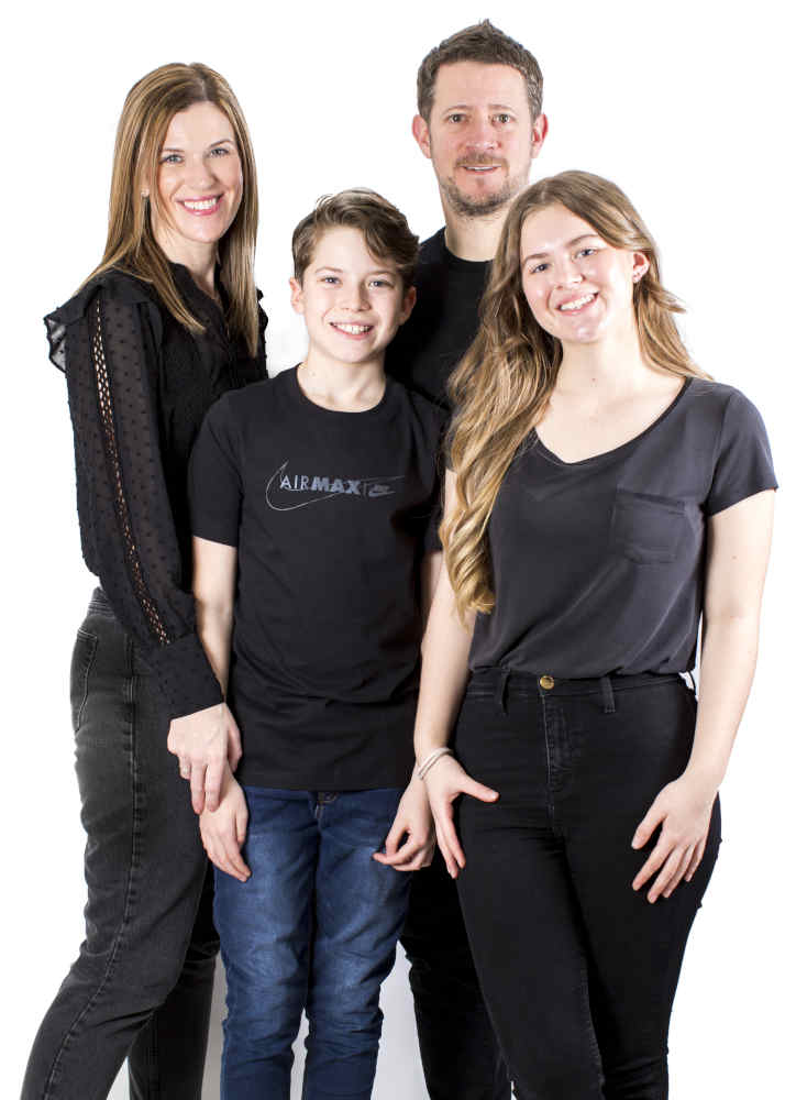 A family photo, all wearing contact lenses from Park Vision